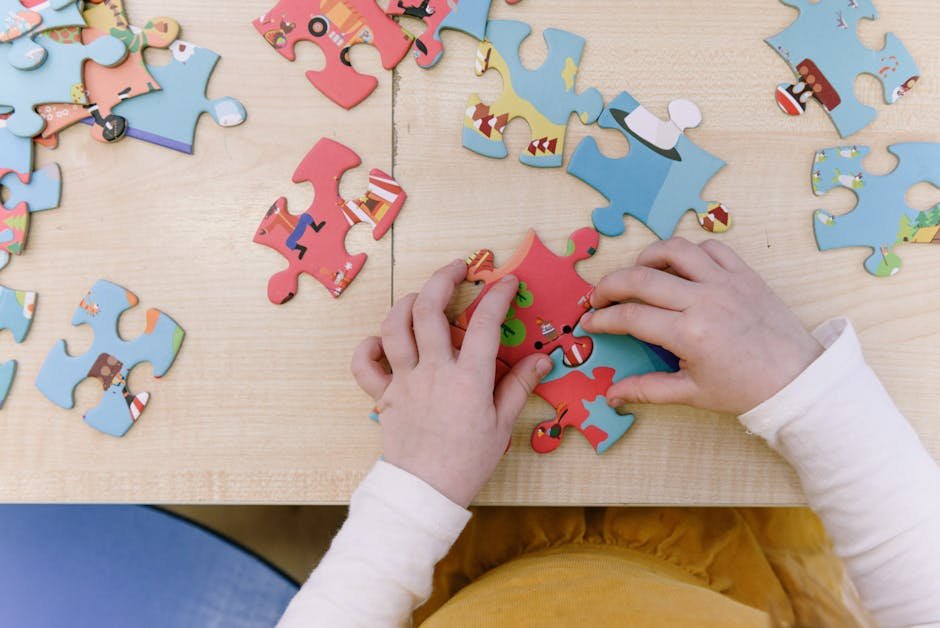Child solving puzzle for math learning