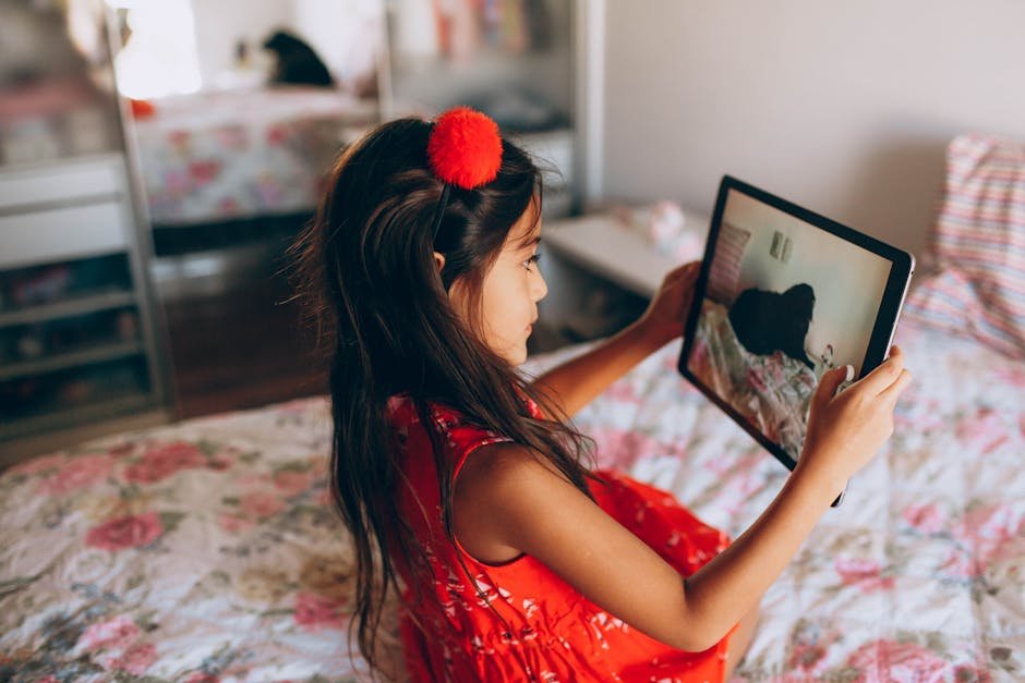 Child using tablet for math learning