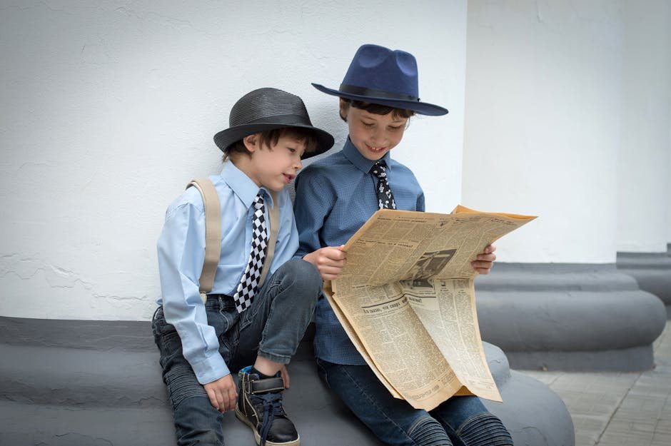Kids reading newspaper for math learning