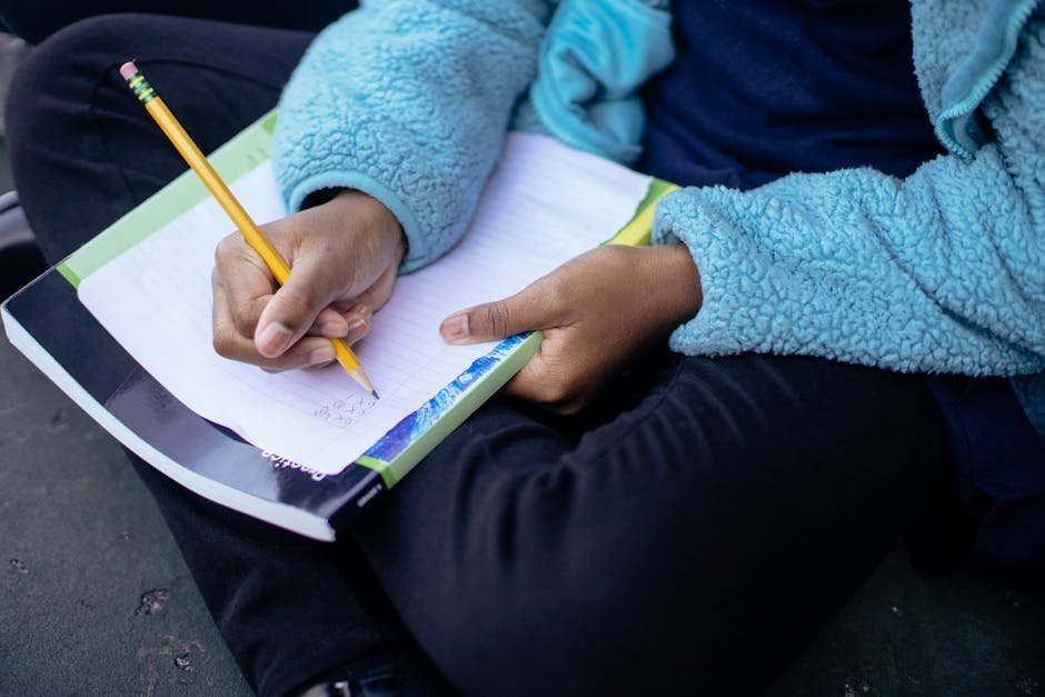 Child writing math for math learning
